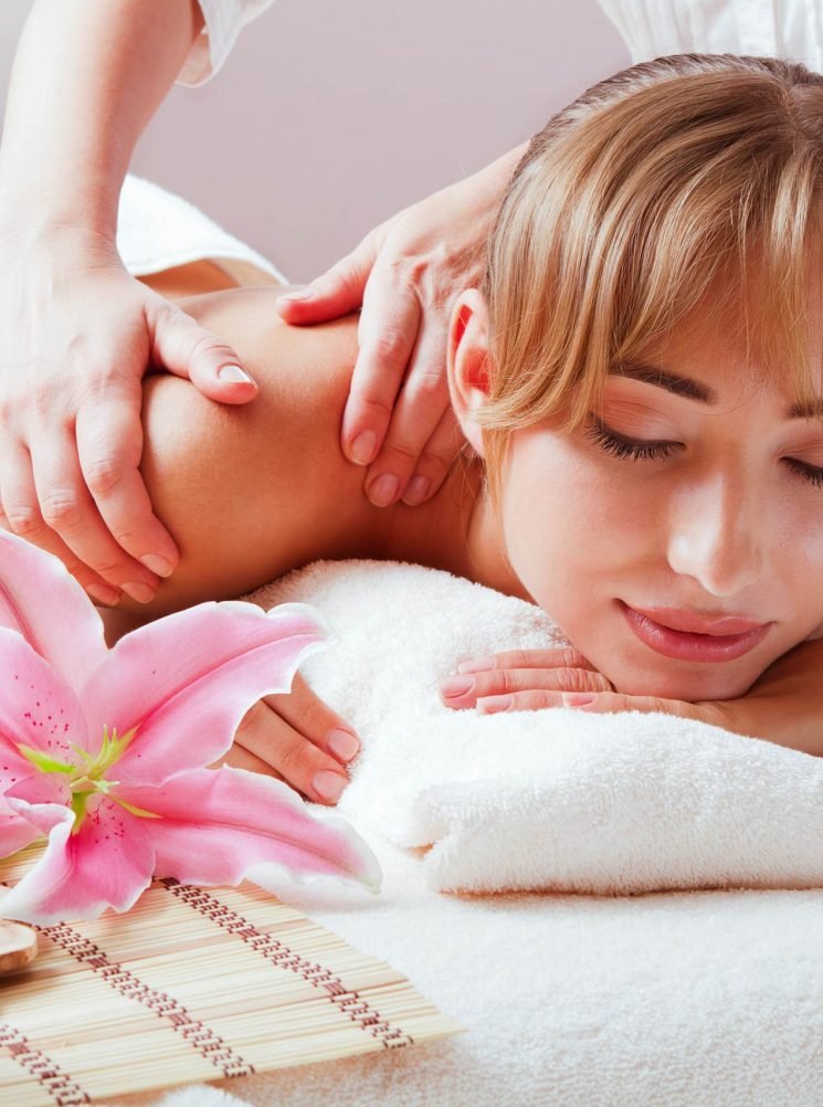 Massage and body care. Spa body massage woman hands treatment. Woman having massage in the spa salon